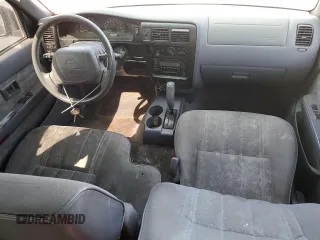 2000 Toyota Tacoma PreRunner with VIN 4TASM92N0YZ651688, listed as a Copart auction lot 50803165 with 116,481 mi miles and Salvage title. Bid and sale history available at DreamBid. Image 8.