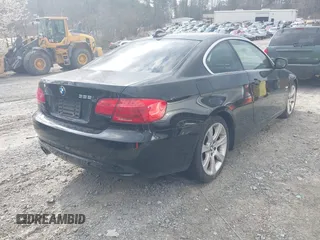 2011 BMW 3 Series 328i xDrive with VIN WBAKF5C52BE586375, listed as a IAAI auction lot 41799526 with 175,314 mi miles. Bid and sale history available at carsss.com. Image 4.