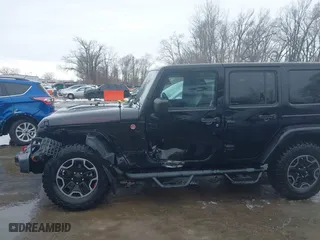2015 Jeep Wrangler Unlimited Rubicon Hard Rock with VIN 1C4HJWFG9FL569962, listed as a IAAI auction lot 41557801 with 78,597 mi miles. Bid and sale history available at carsss.com. Image 6.