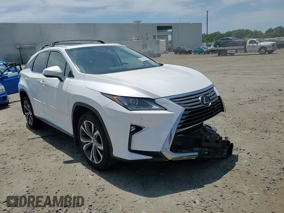 2018 Lexus RX 350 z VIN 2T2BZMCA5JC144799, wystawiony jako Copart lot #57553445 z przebiegiem 59 682 mil mil oraz Szkoda całkowita • Salvage title. Historia ofert i sprzedaży dostępna na DreamBid. Obrazek 14.