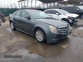 2011 Cadillac CTS Sedan Luxury with VIN 1G6DG5EY7B0163601, listed as a IAAI auction lot 41536256 with 106,523 mi miles. Bid and sale history available at carsss.com. Image 1.