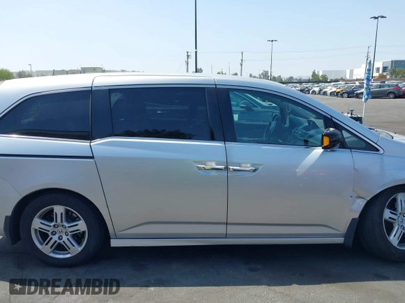 2012 Honda Odyssey Touring с VIN 5FNRL5H91CB004546, выставлен на аукционе IAAI как лот 42175002 с пробегом 118 719 миль миль и . История ставок и продаж доступна на DreamBid. Изображение 13.