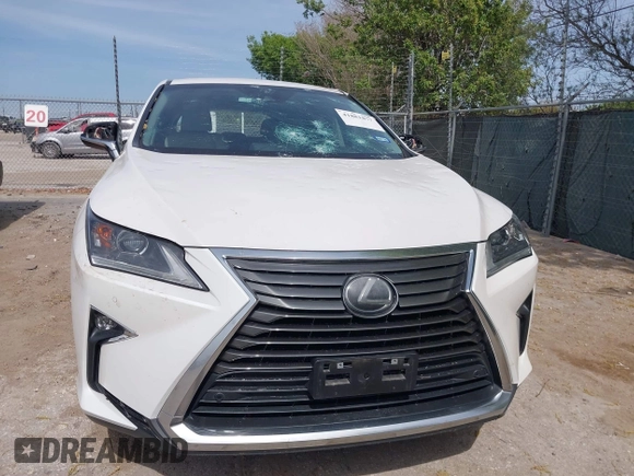 2019 Lexus RX 350 z VIN 2T2ZZMCA4KC126214, wystawiony jako IAAI lot #41881877 z przebiegiem 91 419 mil mil oraz . Historia ofert i sprzedaży dostępna na DreamBid. Obrazek 12.