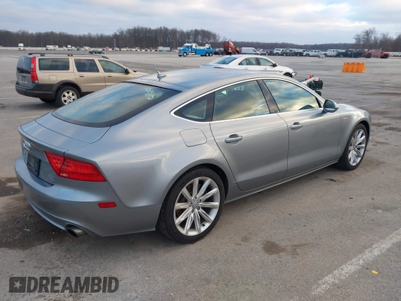 2014 Audi A7 Premium Plus z VIN WAUWGAFC9EN096702, wystawiony jako IAAI lot #41202201 z przebiegiem 103 893 mil mil oraz . Historia ofert i sprzedaży dostępna na DreamBid. Obrazek 4.