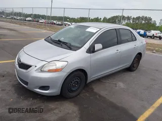 2009 Toyota Yaris with VIN JTDBT903394043218, listed as a IAAI auction lot 41974570 with 281,000 mi miles. Bid and sale history available at carsss.com. Image 2.