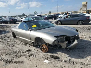 1999 Pontiac Firebird Formula with VIN 2G2FV22G2X2233618, listed as a Copart auction lot 82895584 with 0 mi miles and Salvage Title. Bid and sale history available at carsss.com. Image 4.