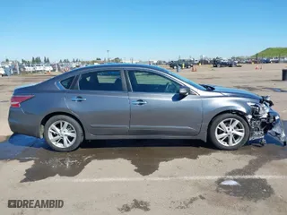2014 Nissan Altima 2.5 with VIN 1N4AL3AP7EC276289, listed as a IAAI auction lot 41859119 with 87,732 mi miles. Bid and sale history available at carsss.com. Image 13.