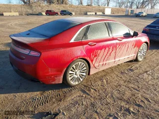 2014 Lincoln MKZ with VIN 3LN6L2G95ER834818, listed as a IAAI auction lot 41512938 with 77,207 mi miles. Bid and sale history available at carsss.com. Image 4.