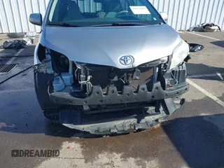 2011 Toyota Sienna LE AAS with VIN 5TDKK3DC7BS154584, listed as a IAAI auction lot 42013919 with 155,071 mi miles and . Bid and sale history available at DreamBid. Image 6.