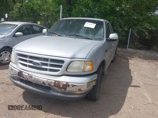 2001 Ford F-150 with VIN 2FTZX17221CB01390, listed as a IAAI auction lot 42194407 with 239,834 mi miles and . Bid and sale history available at DreamBid. Image 2.