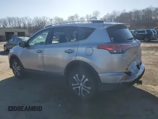 2016 Toyota RAV4 LE with VIN 2T3BFREV4GW451616, listed as a Copart auction lot 50143575 with 128,034 mi miles and Salvage Title. Bid and sale history available at DreamBid. Image 2.