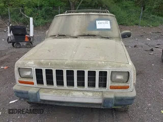 2001 Jeep Cherokee Sport with VIN 1J4FT48S21L516398, listed as a IAAI auction lot 42072391 with 187,730 mi miles. Bid and sale history available at carsss.com. Image 6.