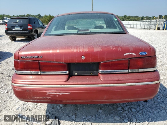 1997 Ford Crown Victoria LX с VIN 2FALP74W7VX148869, выставлен на аукционе Copart как лот 69004924 с пробегом 226 648 миль миль и Списание • Salvage title. История ставок и продаж доступна на DreamBid. Изображение 6.