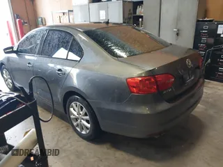 2011 Volkswagen Jetta Sedan SE PZEV with VIN 3VWDZ7AJ9BM369301, listed as a IAAI auction lot 41982641 with 114,217 mi miles. Bid and sale history available at carsss.com. Image 3.