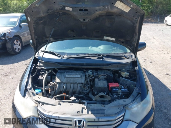 2010 Honda Insight LX with VIN JHMZE2H5XAS018840, listed as a IAAI auction lot 42138165 with 188,467 mi miles and . Bid and sale history available at DreamBid. Image 10.