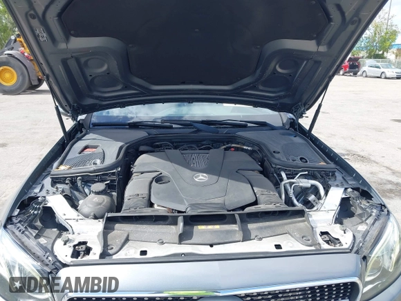 2018 Mercedes-Benz E 400 with VIN WDD1J6FB9JF015064, listed as a IAAI auction lot 42165914 with 95,290 mi miles and . Bid and sale history available at DreamBid. Image 10.