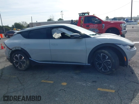 2024 Kia EV6 Wind with VIN KNDC34LA1R5214852, listed as a IAAI auction lot 41818262 with 14,950 mi miles and . Bid and sale history available at DreamBid. Image 13.