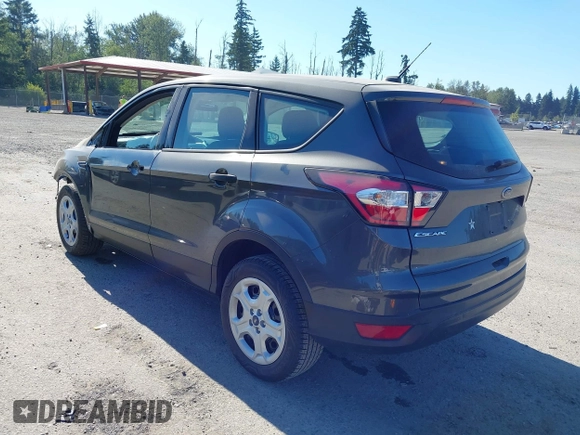 2018 Ford Escape S with VIN 1FMCU0F75JUD05716, listed as a IAAI auction lot 42733113 with 69,469 mi miles and . Bid and sale history available at DreamBid. Image 3.