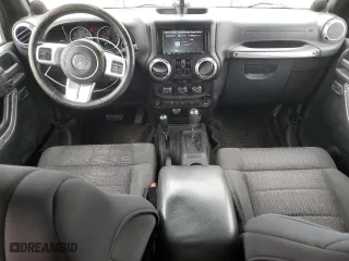 2011 Jeep Wrangler Unlimited Sahara with VIN 1J4HA5H14BL507148, listed as a Copart auction lot 52480325 with 233,835 mi miles and Clean Title. Bid and sale history available at carsss.com. Image 8.