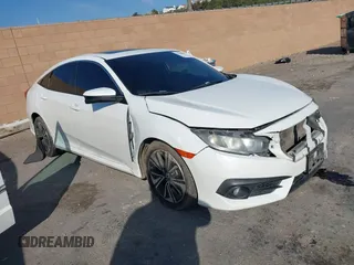 2016 Honda Civic Sedan EX-T with VIN 2HGFC1F31GH633820, listed as a IAAI auction lot 41448059 with 135,243 mi miles. Bid and sale history available at carsss.com. Image 1.