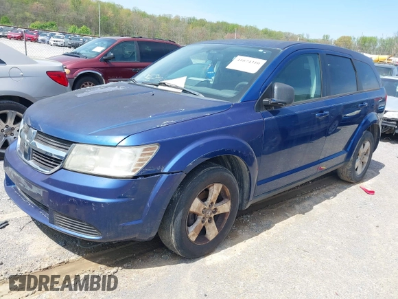2009 Dodge Journey SXT with VIN 3D4GG57V89T551949, listed as a IAAI auction lot 41874310 with 170,084 mi miles. Bid and sale history available at carsss.com. Image 2.