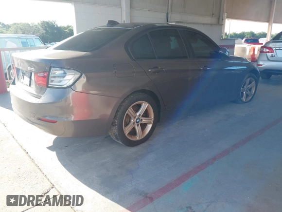 2013 BMW 3 Series 320i with VIN WBA3B1C54DK129838, listed as a IAAI auction lot 42752788 with 95,262 mi miles and . Bid and sale history available at DreamBid. Image 4.