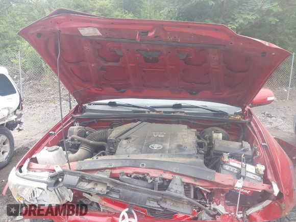 2013 Toyota Tacoma PreRunner z VIN 5TFJU4GN2DX037582, wystawiony jako IAAI lot #42285294 z przebiegiem 162 147 mil mil oraz . Historia ofert i sprzedaży dostępna na DreamBid. Obrazek 10.