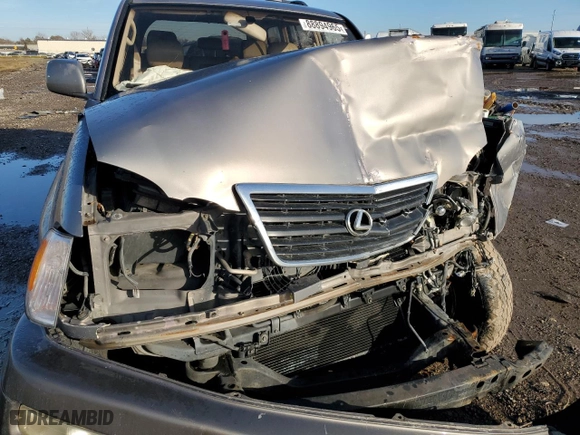 1999 Lexus LX 470 Luxury SUV with VIN JT6HT00W6X0067685, listed as a Copart auction lot 88894965 with 0 mi miles and Salvage Title. Bid and sale history available at carsss.com. Image 13.