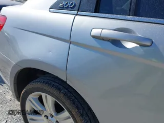 2013 Chrysler 200 Touring with VIN 1C3CCBBB4DN693621, listed as a IAAI auction lot 41738436 with 240,693 mi miles and . Bid and sale history available at DreamBid. Image 11.