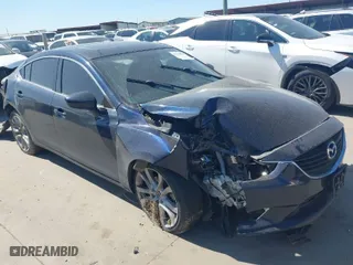 2015 Mazda Mazda6 i Touring with VIN JM1GJ1V51F1179528, listed as a IAAI auction lot 41754576 with 83,310 mi miles. Bid and sale history available at carsss.com. Image 1.