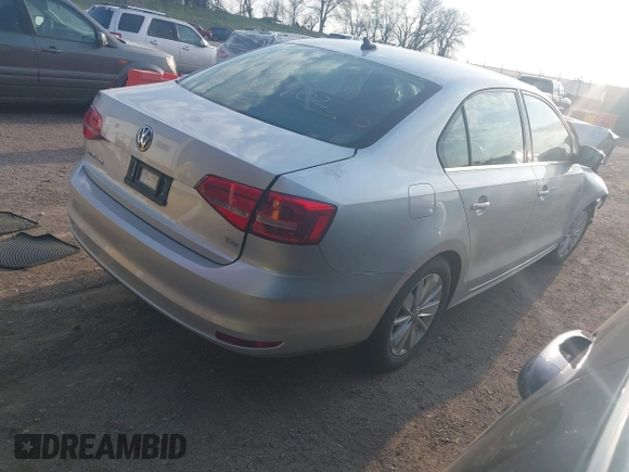 2015 Volkswagen Jetta SE with VIN 3VWD17AJ9FM274069, listed as a IAAI auction lot 42103263 with 76,984 mi miles and . Bid and sale history available at DreamBid. Image 4.