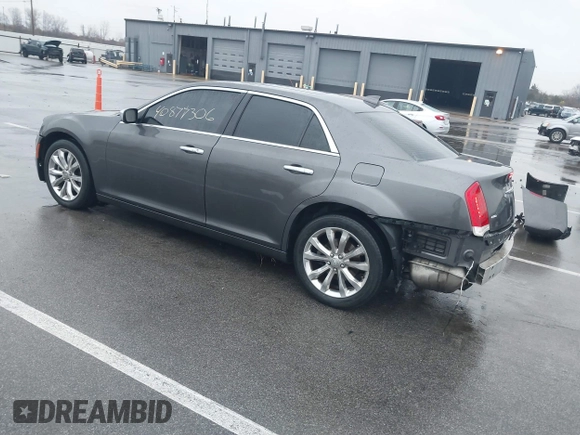 2016 Chrysler 300 with VIN 2C3CCAKG5GH334703, listed as a IAAI auction lot 40877306 with 141,799 mi miles. Bid and sale history available at carsss.com. Image 3.