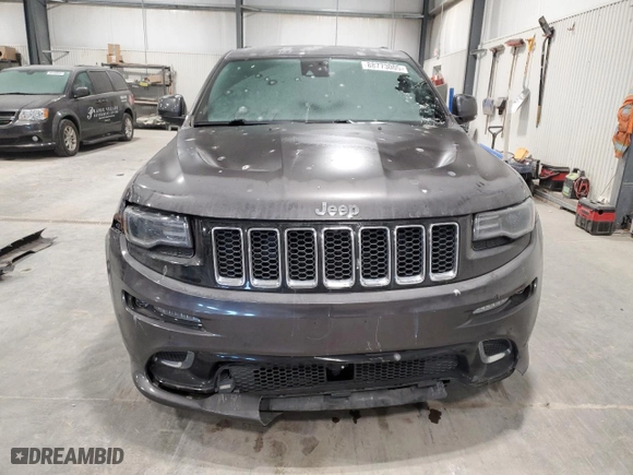 2015 Jeep Grand Cherokee SRT with VIN 1C4RJFDJ8FC752210, listed as a Copart auction lot 88773005 with 76,721 mi miles and Salvage Title. Bid and sale history available at carsss.com. Image 5.