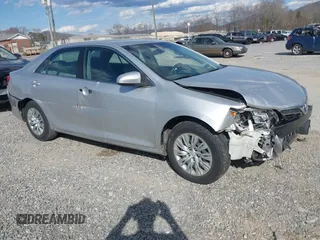 2014 Toyota Camry L with VIN 4T1BF1FK3EU301041, listed as a IAAI auction lot 41858386 with 136,998 mi miles and . Bid and sale history available at DreamBid. Image 1.