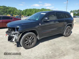2017 Jeep Grand Cherokee Trailhawk with VIN 1C4RJFLG7HC635372, listed as a Copart auction lot 57421675 with 201,752 mi miles and Salvage title. Bid and sale history available at DreamBid. Image 1.
