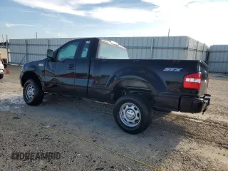 2007 Ford F-150 STX with VIN 1FTRF02297KD15057, listed as a Copart auction lot 73847974 with 184,413 mi miles and Salvage Title. Bid and sale history available at carsss.com. Image 2.