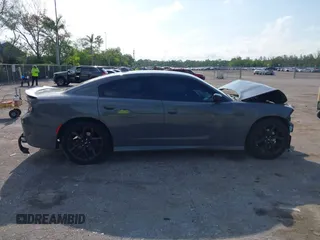 2019 Dodge Charger GT z VIN 2C3CDXHG4KH714020, wystawiony jako IAAI lot #42303028 z przebiegiem 159 591 mil mil oraz . Historia ofert i sprzedaży dostępna na DreamBid. Obrazek 13.