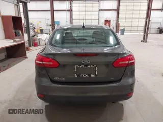 2017 Ford Focus SE with VIN 1FADP3F28HL314308, listed as a IAAI auction lot 42175299 with 74,917 mi miles and . Bid and sale history available at DreamBid. Image 16.