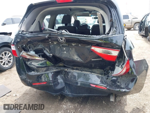 2012 Honda Odyssey Touring with VIN 5FNRL5H91CB121950, listed as a IAAI auction lot 42456620 with 200,831 mi miles and . Bid and sale history available at DreamBid. Image 16.