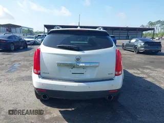 2013 Cadillac SRX Luxury Collection with VIN 3GYFNCE33DS608040, listed as a IAAI auction lot 41912860 with 128,295 mi miles and . Bid and sale history available at DreamBid. Image 16.