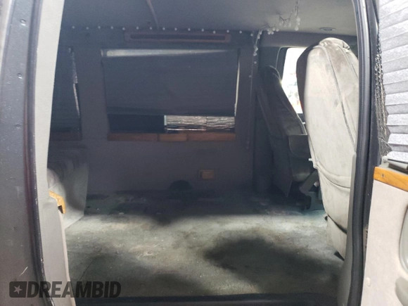 2004 GMC Savana Cargo Van YF7 Upfitter with VIN 1GDFG15T041147283, listed as a Copart auction lot 82193844 with 264,051 mi miles and Salvage Title. Bid and sale history available at carsss.com. Image 11.