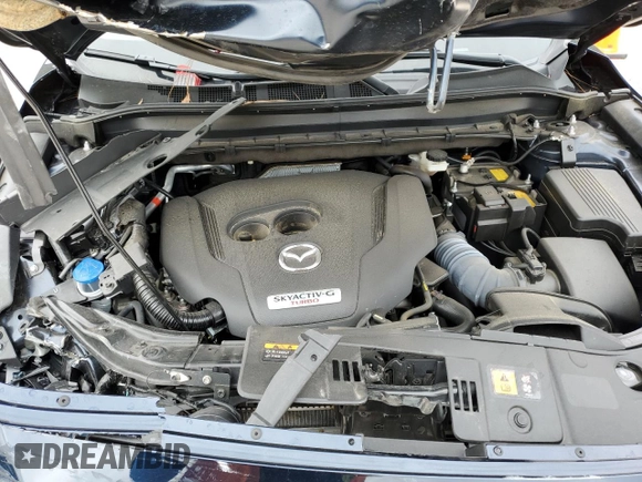 2022 Mazda CX-5 2.5 Turbo with VIN JM3KFBAY3N0603921, listed as a Copart auction lot 43679495 with 27,073 mi miles and Salvage Title. Bid and sale history available at carsss.com. Image 12.