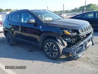 2019 Jeep Compass Trailhawk with VIN 3C4NJDDB5KT800515, listed as a IAAI auction lot 42059594 with 60,338 mi miles and . Bid and sale history available at DreamBid. Image 1.