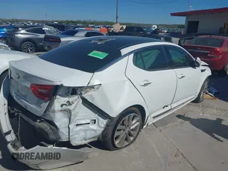 2015 Kia Optima SXL Turbo with VIN 5XXGR4A61FG428391, listed as a IAAI auction lot 41869452 with 63,130 mi miles and . Bid and sale history available at DreamBid. Image 4.