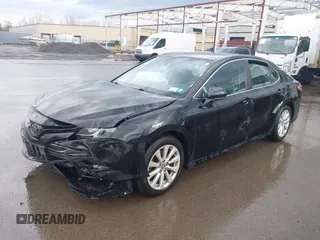 2019 Toyota Camry LE with VIN 4T1B11HK2KU263910, listed as a IAAI auction lot 42060008 with 31,433 mi miles and . Bid and sale history available at DreamBid. Image 17.