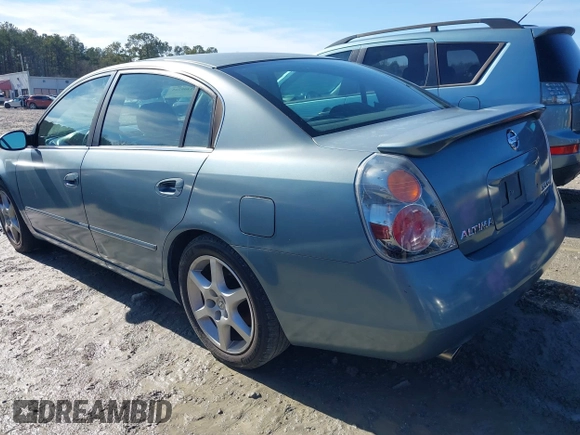2002 Nissan Altima SE with VIN 1N4BL11E22C121586, listed as a IAAI auction lot 41409205 with 213,720 mi miles. Bid and sale history available at carsss.com. Image 3.