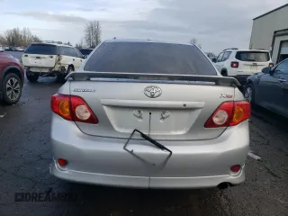 2009 Toyota Corolla XRS with VIN 1NXBE40E39Z004638, listed as a Copart auction lot 85931084 with 205,424 mi miles and Salvage Title. Bid and sale history available at carsss.com. Image 6.