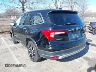 2022 Honda Pilot Touring 7-Passenger with VIN 5FNYF6H63NB006591, listed as a IAAI auction lot 41471359 with 75,574 mi miles. Bid and sale history available at carsss.com. Image 3.