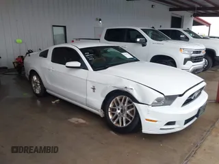 2014 Ford Mustang V6 with VIN 1ZVBP8AM9E5332210, listed as a IAAI auction lot 42395147 with 115,817 mi miles and . Bid and sale history available at DreamBid. Image 1.