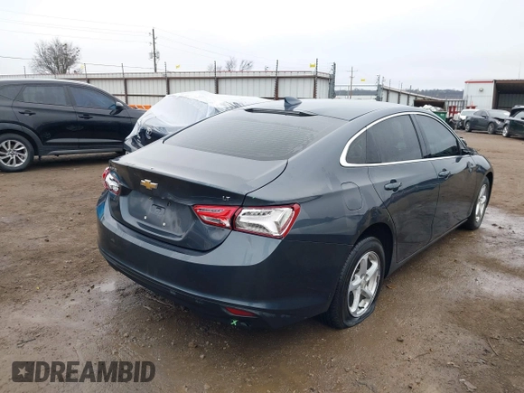 2019 Chevrolet Malibu LT with VIN 1G1ZD5ST4KF141307, listed as a IAAI auction lot 41513580 with 130,388 mi miles and . Bid and sale history available at DreamBid. Image 4.